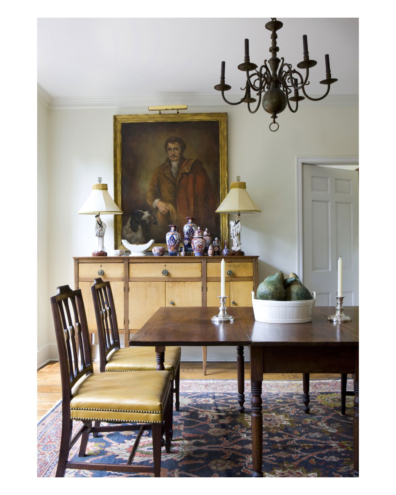 Trey LaFave's Atlanta dining room offers guests collections and elegant antiques to look at and enjoy during long dinners.