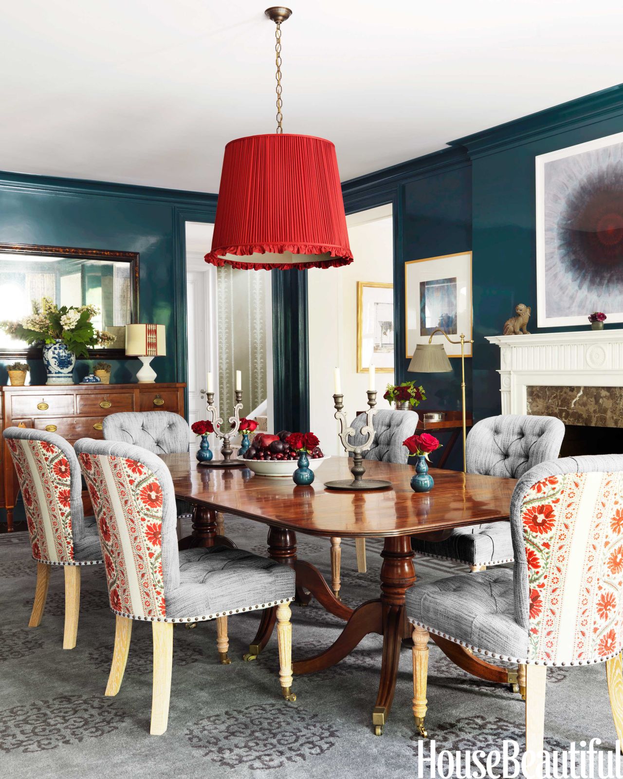 This dining room, decorated by Markham Roberts and featured in the November 2013 issue of House Beautiful, has traditional style and bold color.