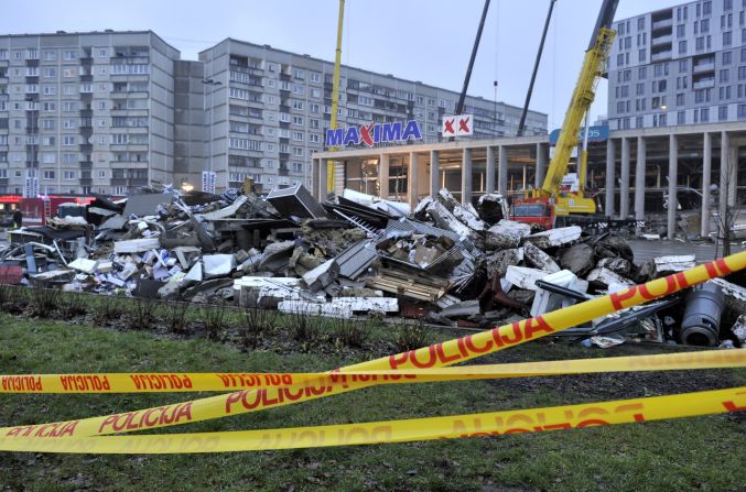 Debris piles up in Riga on November 22 after rescue teams removed it during the search for victims in the roof collapse.
