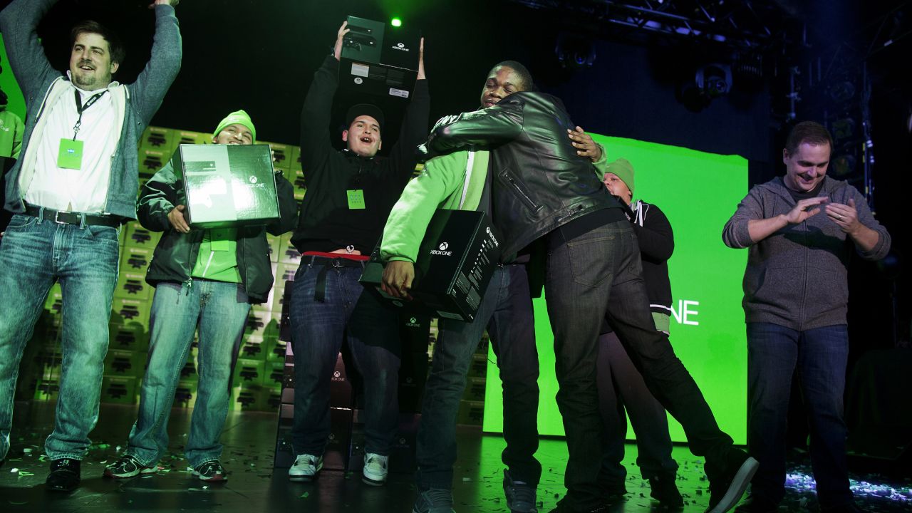 Fans cheer the release of Xbox One at a Microsoft launch event early Friday in New York.