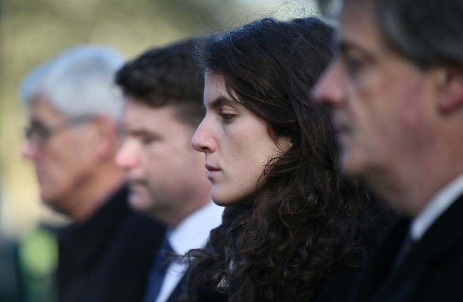 Tatiana Schlossberg, granddaughter of President Kennedy, pauses for a moment of silence during a short ceremony November 22 at the JFK memorial in Runnymede, England.