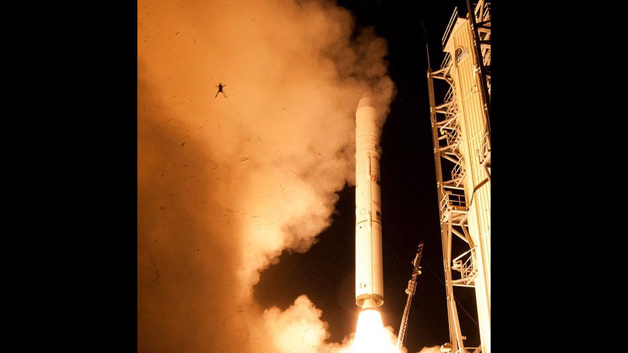 <strong>September 6:</strong> A frog is launched in the air as a rocket takes off at NASA's Wallops Flight Facility in Virginia.