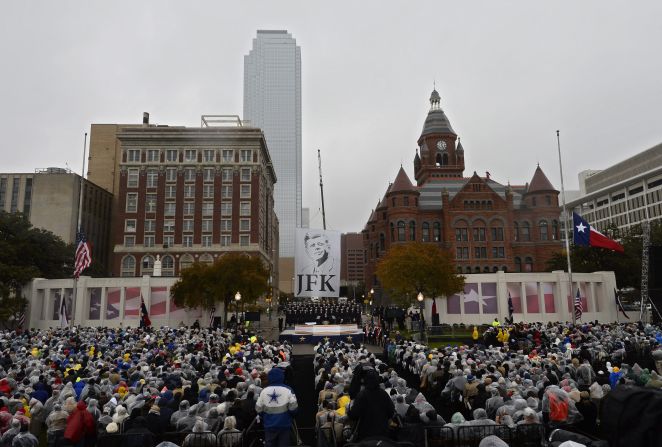 Dallas Mayor Mike Rawlings speaks November 22 at Dealey Plaza, a few feet away from where Kennedy was fatally shot 50 years ago.