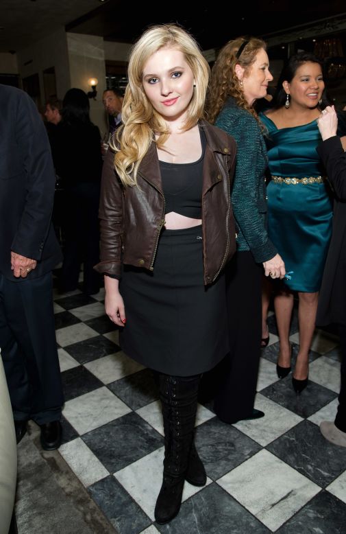 Abigail Breslin rocks the cropped top trend while at the Weinstein Company's party on November 21. 