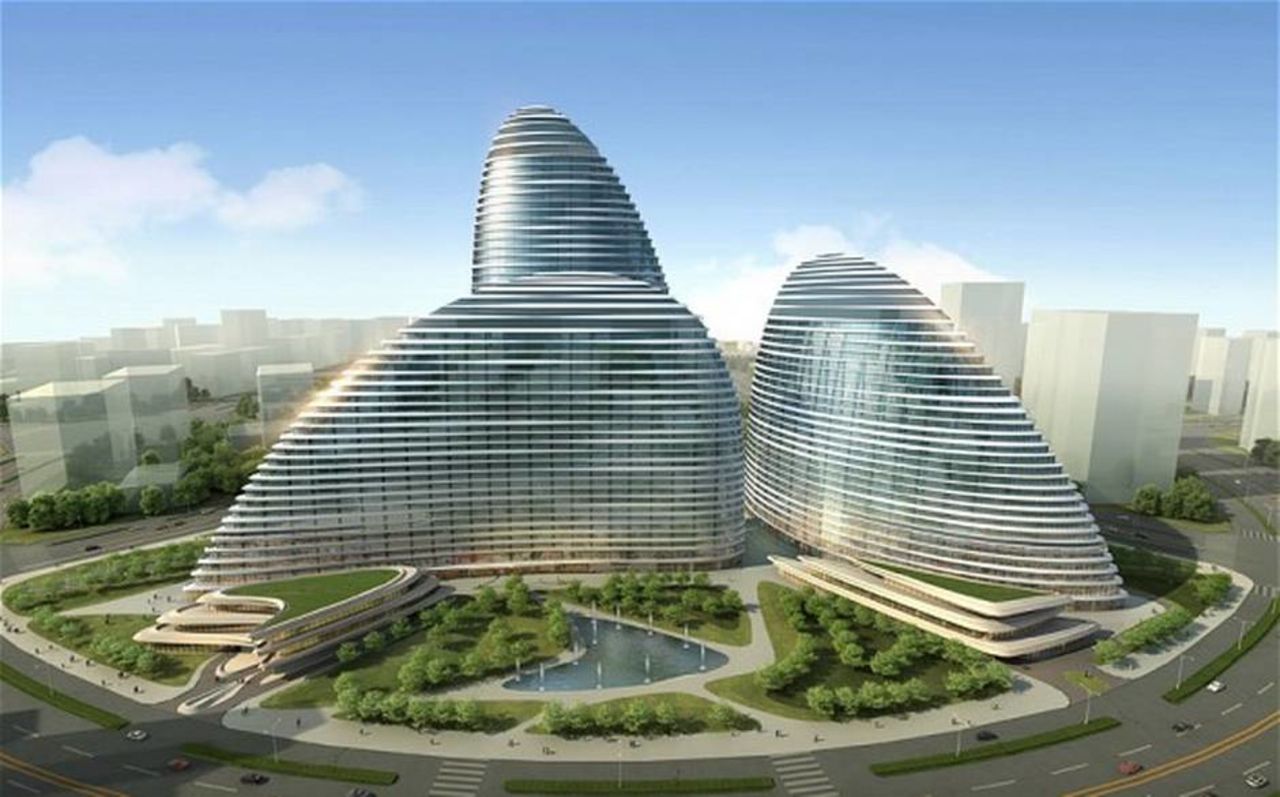 Wangjing SOHO is an office and retail complex in Beijing whose gently curving walls resemble Chinese fans embraced in an entrancing dance. The design, due to be completed in 2014, is meant to evoke the image of Koi, a traditional Chinese symbol of wealth, luck, health and happiness.