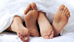 sex couple feet bed