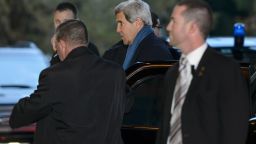 US Secretary of State John Kerry (C) arrives to attend talks over Iran's nuclear programme in Geneva on November 23, 2013. US Secretary of State John Kerry arrived in Geneva on November 23 aiming to secure a landmark deal between Iran and world powers on Tehran's disputed nuclear programme.