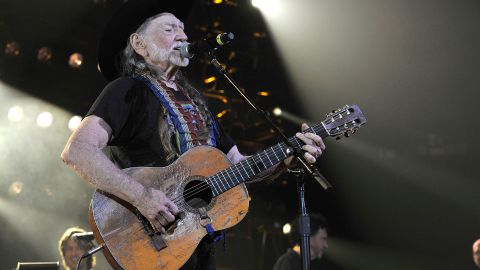 NASHVILLE, TN - APRIL 16:  Willie Nelson performs during Keith Urban's Fourth annual We're All For The Hall benefit concert at Bridgestone Arena on April 16, 2013 in Nashville, Tennessee.  (Photo by Frederick Breedon IV/Getty Images for the Country Music Hall of Fame and Museum)