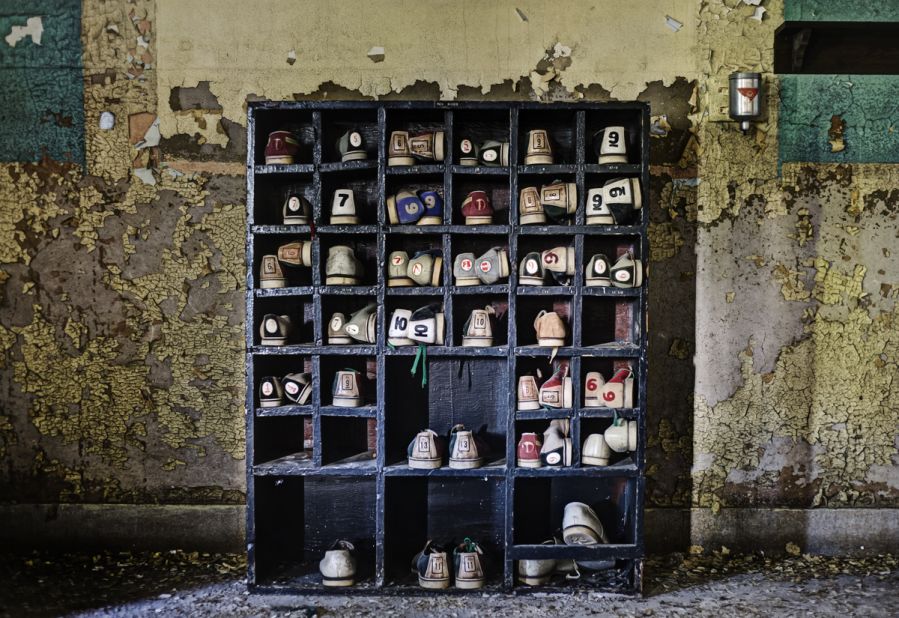 For "States of Decay," the photographers traveled through America's Rust Belt, a geographic term used to describe the economic decline of America's industrial heartland. They found a rack of forgotten bowling shoes in an old asylum in New York.