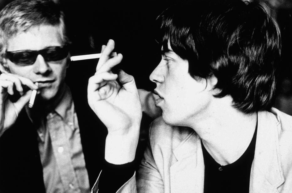 Stones manager Andrew Loog Oldham and Mick Jagger. "The big difference between the Beatles and the Stones were [that] the Beatles made it in America. The Stones were made <em>by</em> America," says Oldham. 