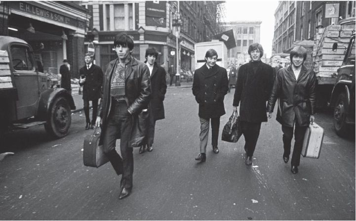 "The Rolling Stones were just these boys walking down the street. First time we got some cash we all went out and bought new guitars and Beatles boots," says guitarist Keith Richards. 