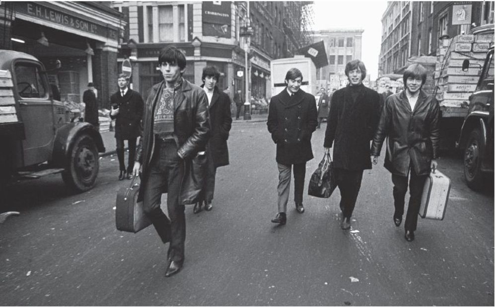 "The Rolling Stones were just these boys walking down the street. First time we got some cash we all went out and bought new guitars and Beatles boots," says guitarist Keith Richards. 