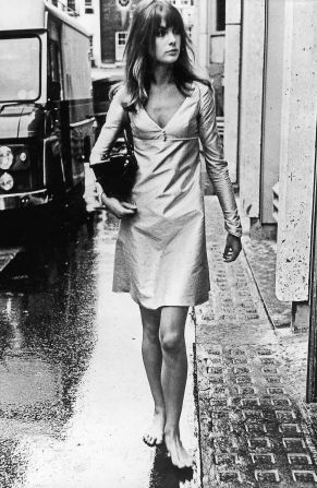 This shot of a barefoot Shrimpton on a rain-soaked street on her way to a fashion shoot typified the burgeoning non-conformism of young men and women in 1963.  