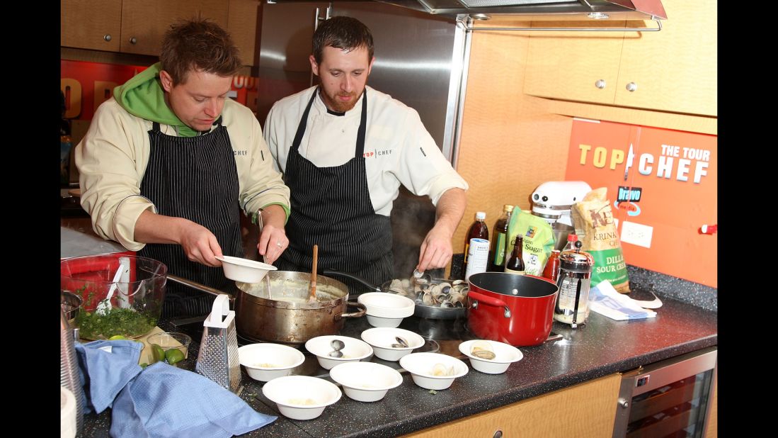 Blais, left, and fellow "Top Chef" contestant Andrew D'Ambrosi demonstrate at a "Top Chef" interactive cooking show in New York in 2008.