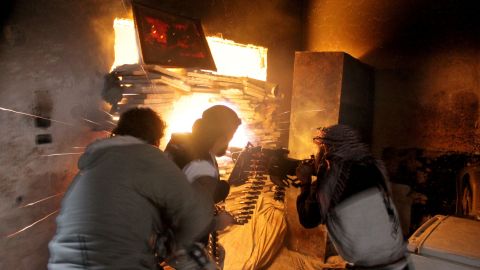 Free Syrian Army rebels battle government forces in Aleppo on Monday, November 18.