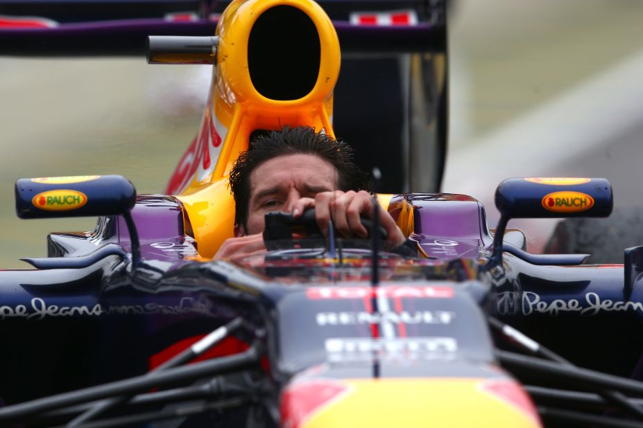 Mark Webber shed his helmet after crossing the line second in his final Grand Prix before departing to sports car racing.