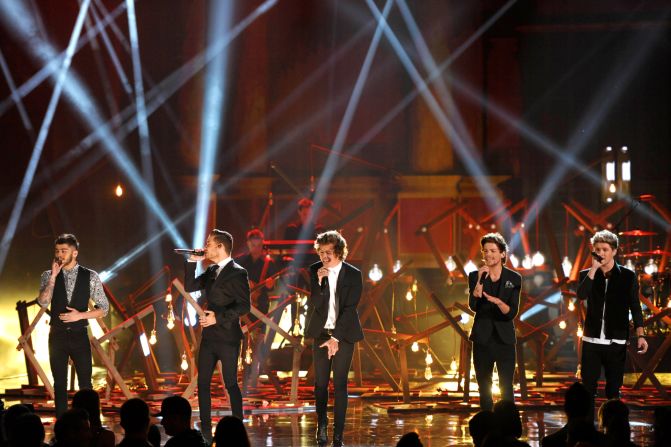 Zayn Malik (from left), Liam Payne, Harry Styles, Louis Tomlinson and Niall Horan of the boy band One Direction perform.