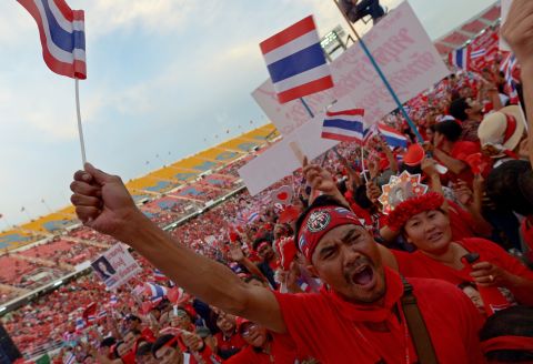 Thai pro-government 'red shirts' gathered at a football stadium to counter the growing anti-government protests and to show support for Prime Minister Yingluck Shinawatra's crisis-hit administration.