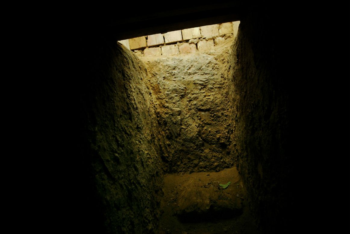 The entrance to the "spider hole" where Hussein was hiding.