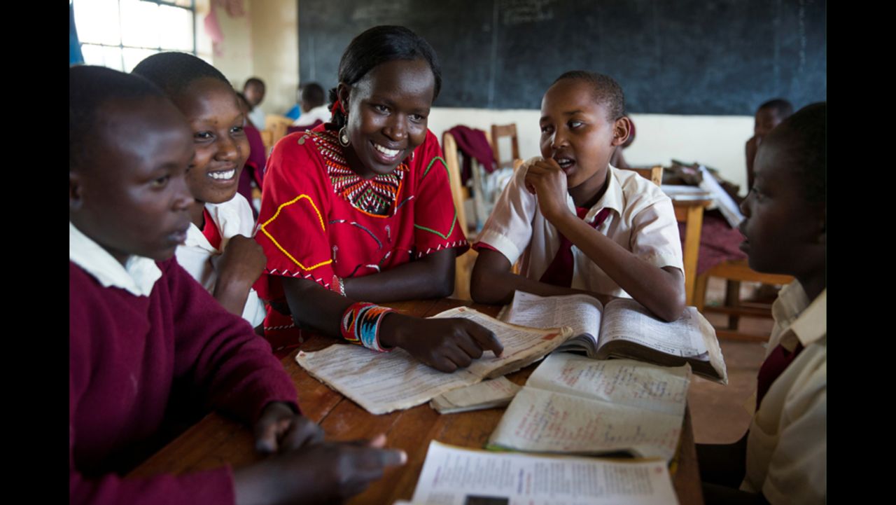 Ntaiya helps students with their studies at the <a href="http://www.kakenyasdream.org/" target="_blank" target="_blank">Kakenya Center for Excellence</a> in Enoosaen, Kenya. Despite free primary education being mandated 10 years ago by the Kenyan government, educating girls is still not a priority for Ntaiya's Maasai culture. According to the Kenyan government, only 11% of Maasai girls in Kenya finish primary school.