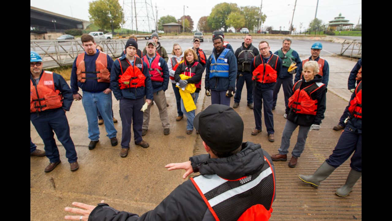 Pregracke talks to volunteers during a recent cleanup of the Illinois River near Pekin, Illinois. "The garbage got into the water one piece at a time," Pregracke says. "And that's the only way it's going to come out."