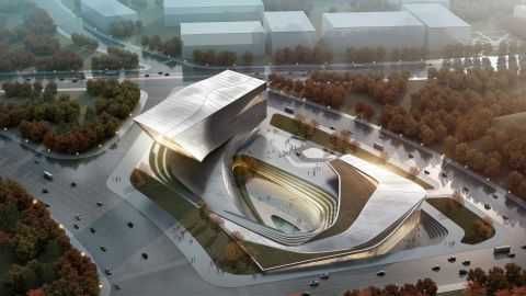 The library in the Chinese city of Dalian is designed to curve sensuously around a central core that will house a public space with a water feature. The building weaves into the ground creating a series of courtyards, before sweeping into the air forming a bold landmark. 