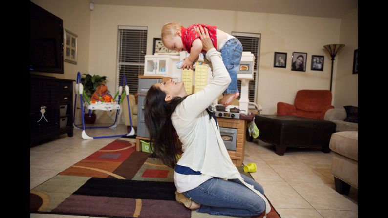 Gletow plays with Gigi's brother in Cape Coral. Gletow recently brought them the toy kitchen seen in the background.
