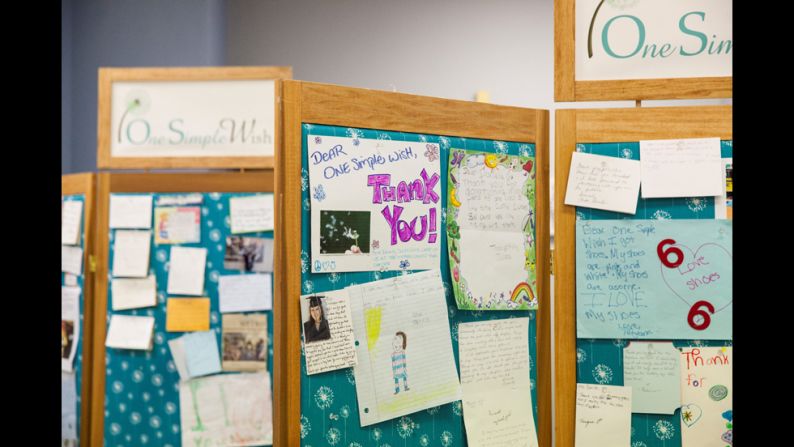 Thank-you notes line the walls of the One Simple Wish offices.