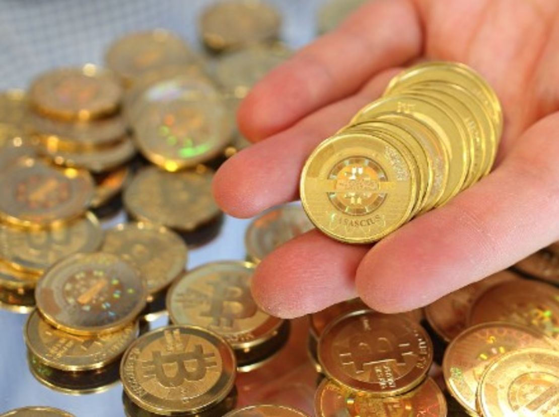 With bitcoin now reaching prices equivalent to an ounce of gold, more investors are turning toward the digital currency for a return on investment. - (Getty Images)