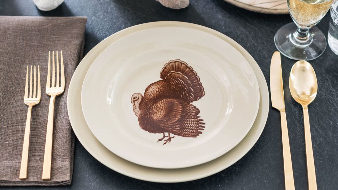 A gorgeous clip-art tom turkey turned decal embellishes a decorative plate.