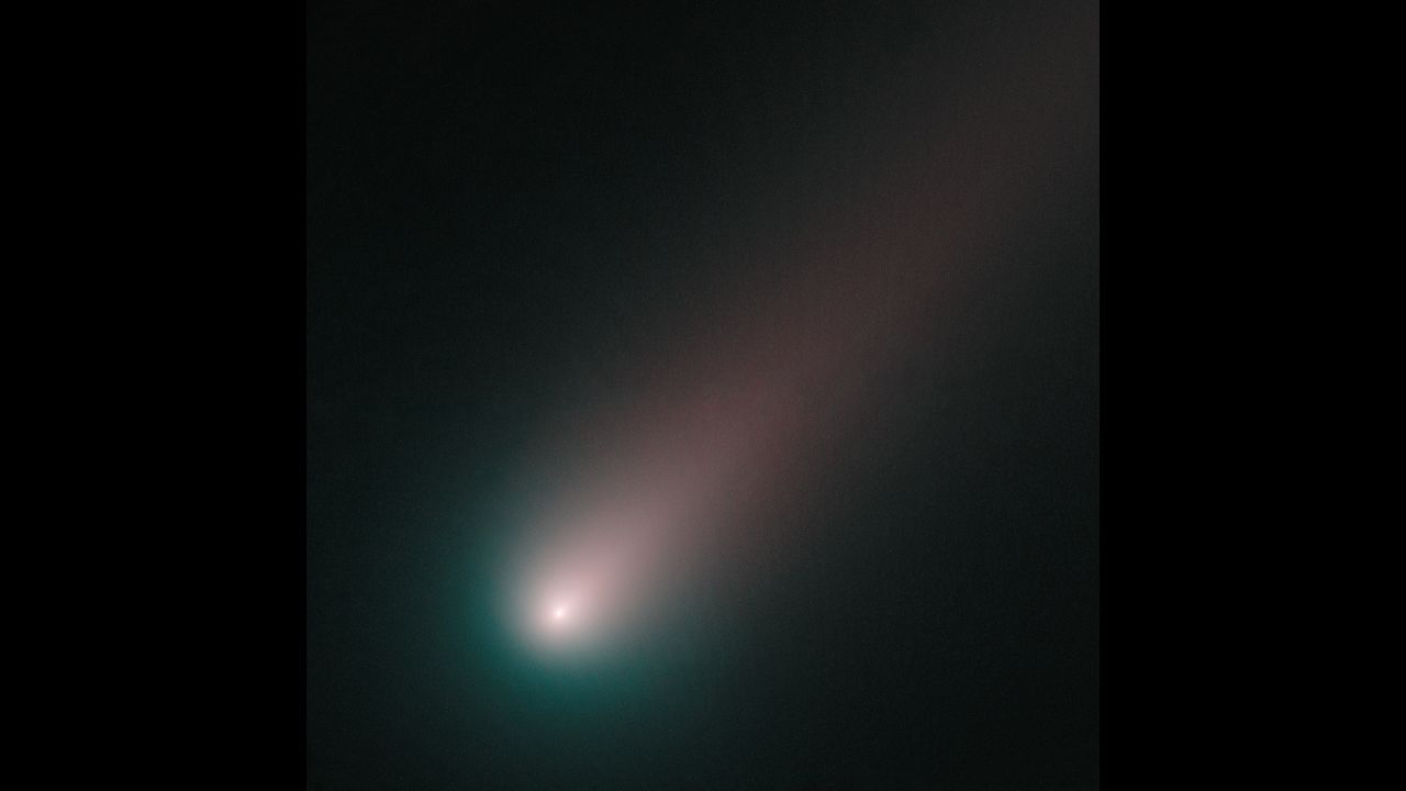 Comet ISON is seen through blue and red filters on November 2. 
