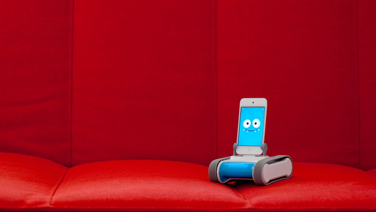 <strong>Romo smartphone robot. </strong>Back in the '90s, there was a big fad for Tamagotchis, little LCD "pets" that required owners to hit buttons to provide care. The latest twist on digital friends is the <a href="http://romotive.com/meet-romo" target="_blank" target="_blank">Romo robot</a>. Simply take an iPhone and put it in the slot of Romo's moving base, and it comes alive. Over time Romo adjusts to its owner's behavior and can even communicate long-distance. The product has won a number of awards and accolades -- which should make it smile. ($149.99)<br />