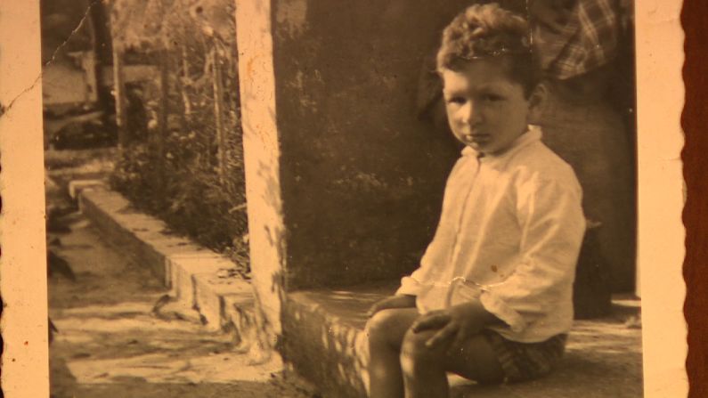 Riva pictured as a boy, before neurofibrosis began to take hold.