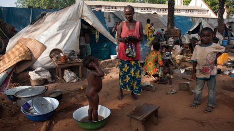 A woman and children are shown at a camp for internally displaced people in the Central African Republic on November 9.