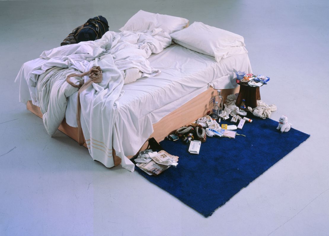 In Emin's "My Bed" (1998), empty alcohol bottles, cigarettes, stained sheets and worn underwear are scattered on and around the bed. According to Emin the bed was in the same state as it had been in her own bedroom while she was battling with depression.