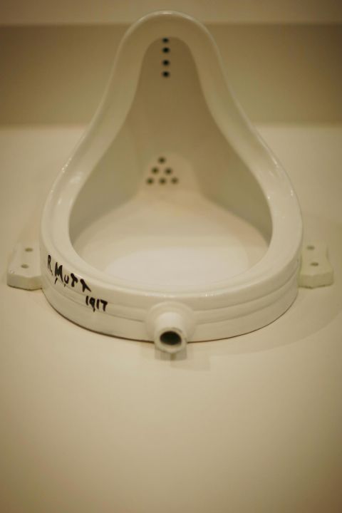 <em>Fountain (1917), Marcel Duchamp </em><br /><br />Arguments against deskilling aren't new. The Society of Independent Artists refused to include Dada pioneer Marcel Duchamp's "Fountain," a standard urinal laid on its back, in an exhibition in spite of the fact that its constitution required it to accept all member submissions. Fountain and Duchamp's other "readymades" (his term for an everyday object positioned as art), sparked modern discussions about what constitutes real art and, by consequence, a real artist. 