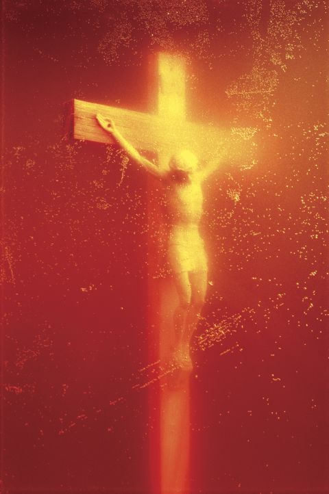<em>Piss Christ (1987), Andres Serrano</em><br /><br />Historically, repurposing religious iconography has been a surefire way to scandalize due to enduring cultural taboos. When Andres Serrano displayed "Piss Christ," a photograph of a crucifix submerged in the artist's urine, it was widely seen as disrespectful to Christians. It eventually earned the condemnation of conservative U.S. Senators and sparked debates around the issue of public arts funding. Twenty-four years later, French Catholic fundamentalists destroyed a print of of the photo on display in Avignon. <br /><br />Though Serrano -- a Christian -- originally said that the piece had no specific political motivation, he has since suggested that it was meant to highlight the continued cheapening of the image of Christ, and the hypocrisy of those who twist the words of Christ to fit their own ends. 