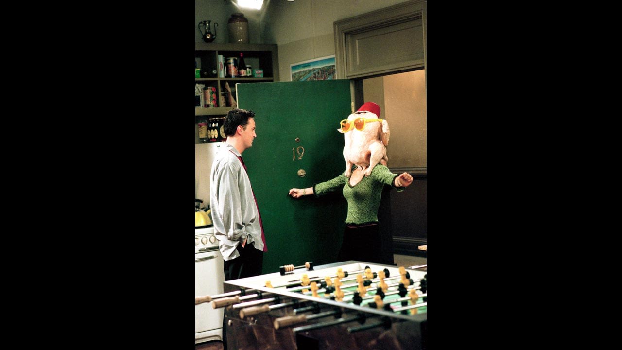 In this first "Friends" Thanksgiving episode, Monica (Courteney Cox) -- shown here with Chandler (Matthew Perry) -- spends much of her day trying to please everyone with an assortment of holiday dishes. However, when Underdog, the Macy's Day parade balloon, floats away, the whole group is locked out of the apartment, leaving the meticulously prepared meal in shambles.
