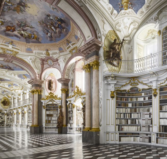 <em>Admont Abbey library, Admont, Austria</em><br /><br /><strong>James Campbell</strong>: "This is one of the largest monastic libraries ever built. The whole thing is a complete work of art. The corridors and staircase that leads to it is relatively simple, so when you enter this stunning space flooded with light there is almost a moment of revelation, a theatrical effect.  There are no desks to work at because these library rooms were never intended for study, but for impressing visitors. The books were taken back to the monks' warm cells to be read. It was built in 1776, a piece de resistance of rococo design."
