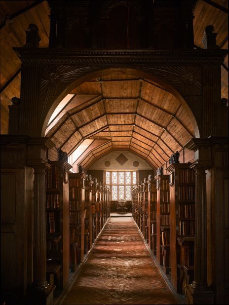<em>Merton College Library, Oxford, UK</em><br /><br /><strong>James Campbell</strong>: "Although the building was completed in 1373 and is one of the oldest academic libraries in the world still in continuous daily use, the fittings date from the late sixteenth century. It is less ornate than Rococo libraries in palace or monastery complexes, because universities did not have access to the same amount of money, but it is still extraordinarily beautiful."