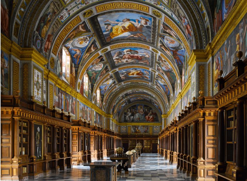 <em>The Escorial Library, San Lorenzo de El Escorial, Spain</em><br /><br /><strong>WIill Pryce</strong>: "This library was ground-breaking. It established the template of using books to decorate the walls of the library which we've been using ever since. The great hall is a harmonious combination of bookshelves, books and a wonderful painted ceiling. It was complete by 1585 and influenced everything that followed it."<br />