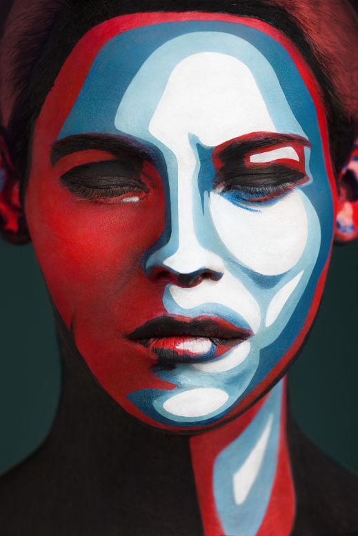 Here, a female model is made to look like a version of the iconic red and blue Obama poster created by graphic designer Shepard Fairey. 