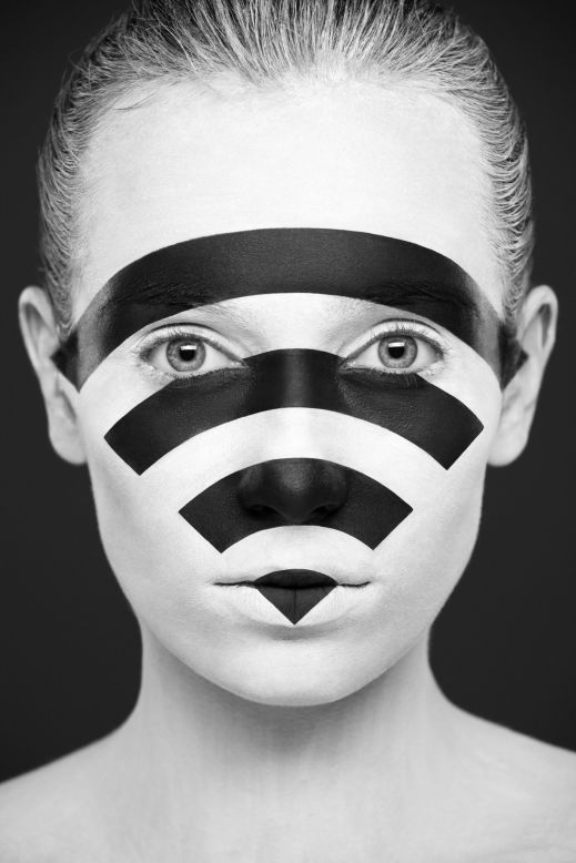 The duo's previous project "Weird Beauty" This Wifi image is part of the "Weird Beauty" series in which commonplace images and symbols are rendered in black and white on the model's faces. 