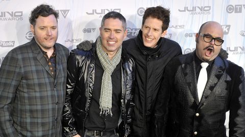 Kevin Hearn, Ed Robertson, Jim Creeggan and Tyler Stewart of Barenaked Ladies pose on the red carpet at the 2011 Juno Awards at the Air Canada Centre in 2011 in Toronto, Canada. 