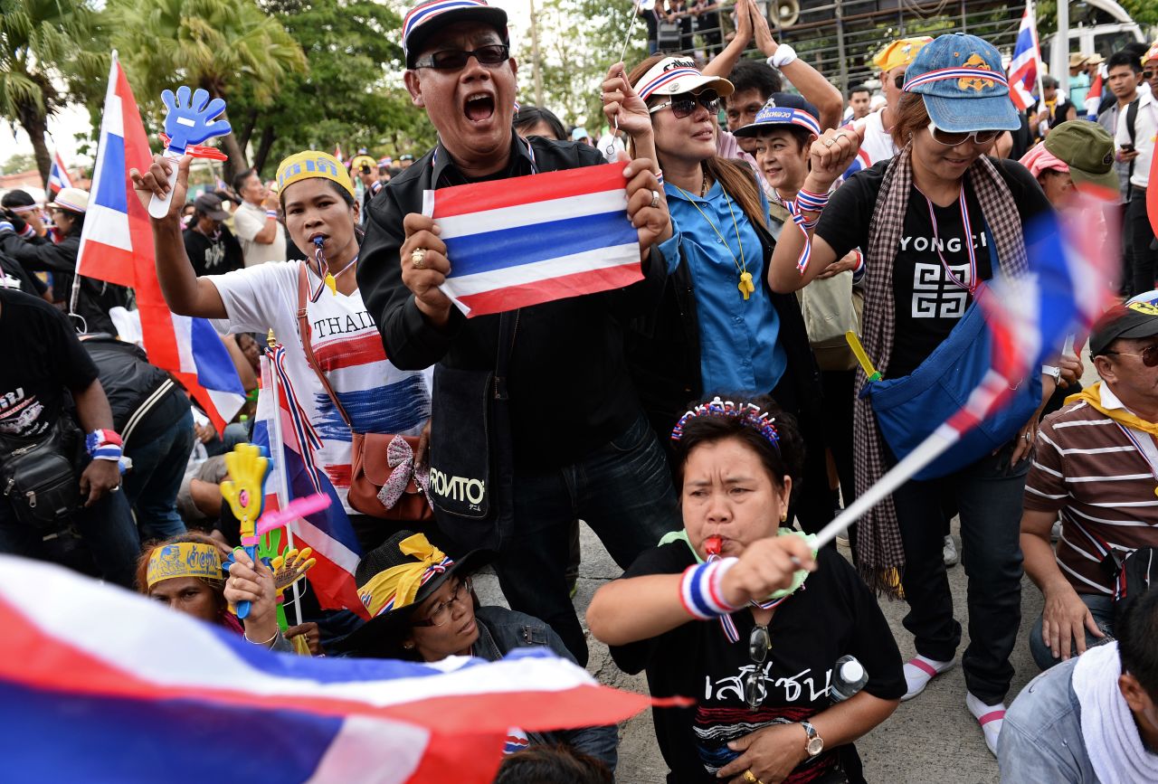 Thailand's mass political protests spread outside the capital on Wednesday as opposition demonstrators stepped up their attempts to overthrow Prime Minister Yingluck Shinawatra's government, plunging the country deeper into crisis.