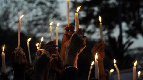 Indian activists hold a candlelight vigil on December 30, 2013 after the death of Nirbhaya.