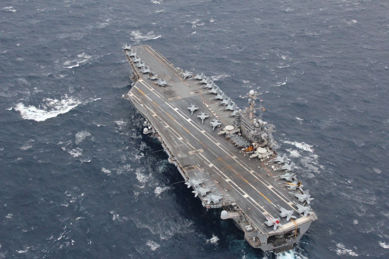 As the United States prepared to mark Thanksgiving, the centerpiece of the U.S. 7th fleet in the Pacific, the USS George Washington, was deployed off the Japanese island of Okinawa.