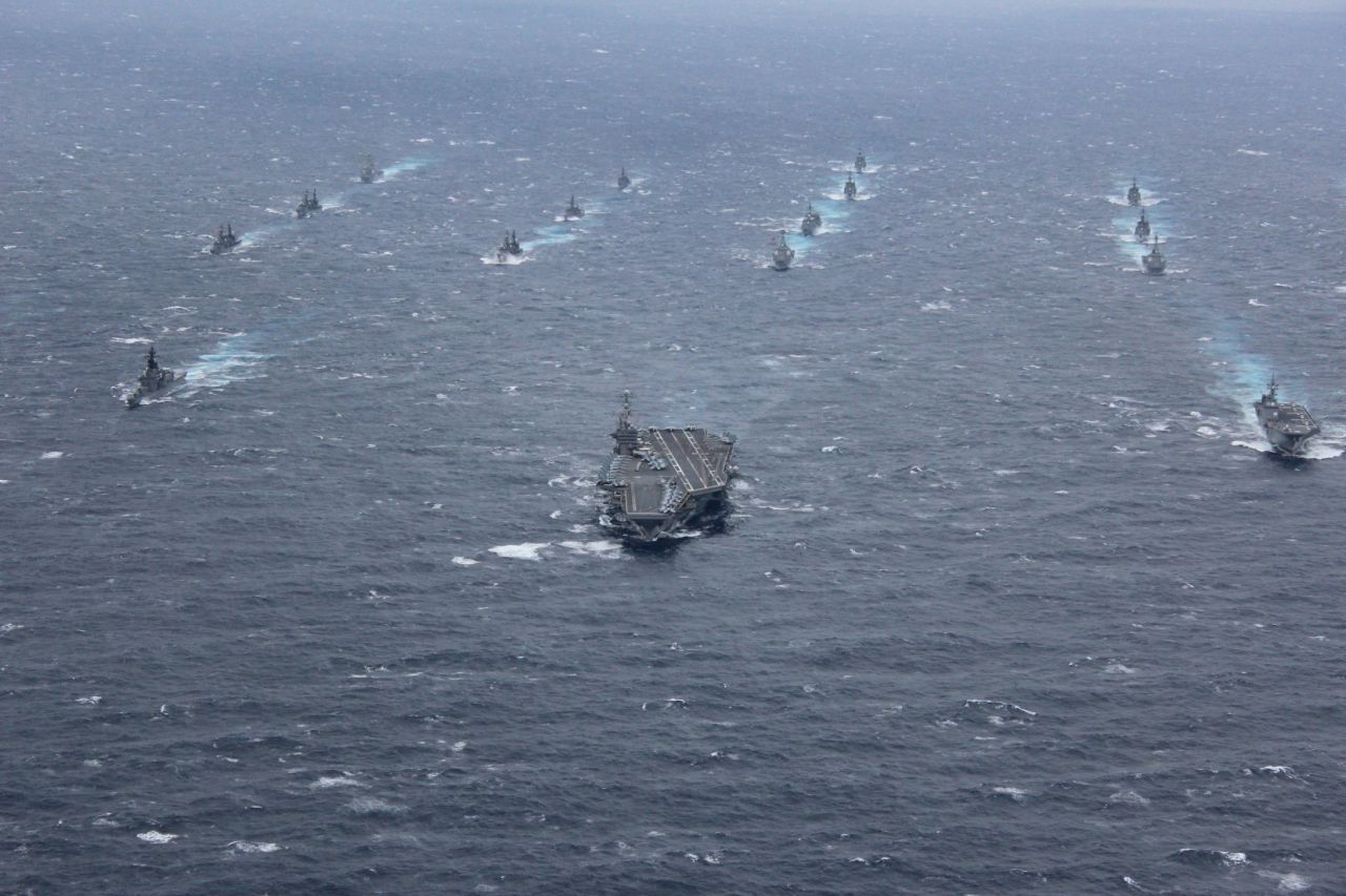 Led by the huge Nimitz-class carrier, this year's AnnualEX 2013 war games brought together dozens of warships from both navies to test their ability to work effectively in a volatile region.
