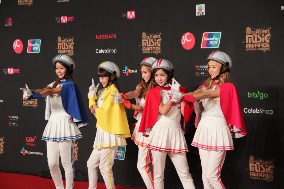 The five-member girl group, Crayon Pop poses in their signature colorful outfits and helmets at Mnet Asian Music Awards in Hong Kong, where they won Best New Female Artist.
