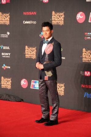 Hong Kong superstar Aaron Kwok arrives at the red carpet at MAMA. The singer, actor and dancer won an award for "Best Asian Artist" and performed a duet with Stevie Wonder and Sistar's Hyolyn.